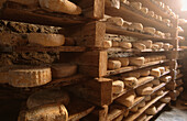 Tomme typical cheese at Ivano Challier farm. Balboutet, Usseaux. Orsiera Rocciavrè Natural Park area, Piedmont, Italy