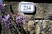 House number at street. Pitigliano. Tuscany, Italy