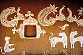 A wall richly decorated with animal figures. Village near Tonk, Rajasthan. India