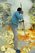 Mining Sulfur by Hand in Kawah Ijen Volcano. Java island. Indonesia.