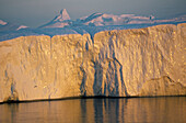 Icebergs on Icefjord. Diskobay at midnight sun. Greenland