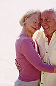  Couple, Couples, Daytime, Embrace, Embracing, Exterior, Female, Fondness, Gray-haired, Grey-haired