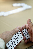 Adult, Adults, Board game, Board games, Close up, Close-up, Closeup, Color, Colour, Contemporary, Detail, Details, Domino, Dominoes, Dominos, Game, Games, Hand, Hands, Hold, Holding, Human, Indoor, Indoors, Inside, Interior, Leisure, Male, Man, Men, Men 