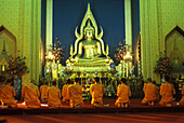 Buddist monks praying, Wat benchamabophit (marble temple)bangkok, Thailand.