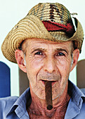 Portrait of tobacco farmer smoking cigar. Viñales. Cuba