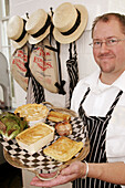 Virginia, Middleburg, Washington Street, Home Farm Store, man, meat, pastry