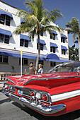 1960 Chevrolet, red, classic car. Art Deco Weekend, Ocean Drive. Miami Beach. Florida. USA.
