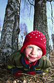 Two year old girl in the forest. Västerbotten, Sweden