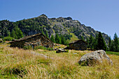 Stone houses at Alp Roggione, Bernina range, Italy