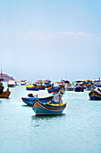 Typical maltese fishing boats in the sunlight, Marsaxlokk, Malta, Europe