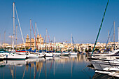 Sailing boats at the marina in front of St. Joseph Church, Msida, Malta, Europe