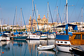 Sailing boats at the marina in front of St. Joseph Church, Msida, Malta, Europe