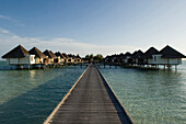 Over Water Villas and wooden jetty, Four Season Resort at Kuda Huraa, Maldives