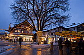 Christmassy decorated houses in the evening, Garmisch, Garmisch-Partenkirchen, Upper Bavaria, Germany