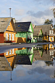Wooden houses on the main road in the village of Trakai, Lithuania