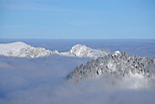 Snow-covered mountain scene with fog down in the valley, Sonnenkopf, Sonthofen, Allgaeu range, Allgaeu, Swabia, Bavaria, Germany