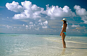 Woman on a beach in Ari Atoll. Maldives