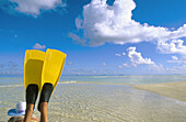 Woman on a beach in Ari Atoll. Maldives