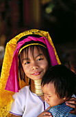 Long neck girl with child. Long Neck Hilltribe. Chiang Mai. Thailand