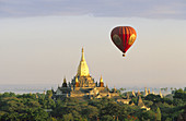 Hot air balloon over Ananda temple. Bagan. Myanmar (Burma)