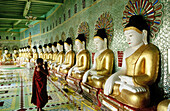 Novice monk at U-Min Thonze Pagoda. Sagaing. Mandalay. Myanmar (Burma).