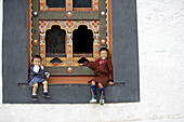 Bhutan. Thimpu. Thimpu Dzong Monastery. Buddhist Festival (Tsechu). Bhutanese little boys.