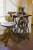 Sewing machine and stool at Olivas Adobe (California Historical Landmark), Ventura, California