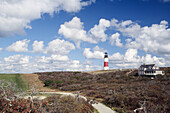 Sankaty Head lighthouse, cumulus clouds, Nantucket, Massachusetts. USA.