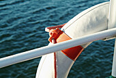Life-belt on a Ferry (Weisse Flotte) on Chiemsee. Chiemgau. Bavaria. Germany