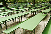Empty tables in the beergarden near the Chinese Tower. English Gardens. Munich. Bavaria. Germany