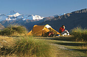 Campsite on Mt. Roy. Mt. Aspiring behind. Above lake Wanaka, central Otago. New Zealand.