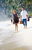 Couple walking on the beach. Venezuela