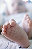 Infant boy s feet