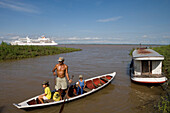 Amazonian Indian Family and MS Europa on a sidearm of the Amazon River, Boca da Valeria, Amazonas, Brazil, South America