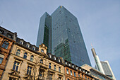 Traditional buildings in front of skyscrap, Frankfurt, Hesse, Germany