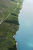 NEW ZEALAND Queenstown. Aerial view of Lake Wakatipu , road follow shoreline