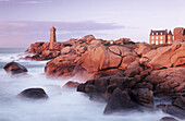 Granite coastline and lighthouse of Pors Kamor. Brittany, France