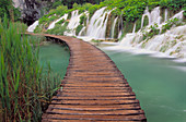 Waterfall, Plitvice lake. Wooden walkway along the waterfalls. Plitvice National Park, Croatia
