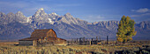 Mormon Row barn in front of Grand Teton Range, Antelope Flats, Grand Teton National Park, Wyoming, USA