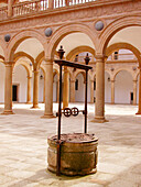 Well at the courtyard, Hospital Tavera (built 16th century). Toledo. Spain