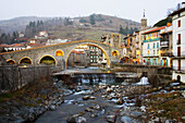 Romanesque bridge (12th century) over Ter river. Camprodon, Ripollès. Girona province, Catalonia, Spain