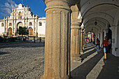 Columns from Captains Palace and Santiago s Cathedral at the background. Antigua Guatemala. Sacatepéquez department. Guatemala