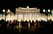 Viewers at night at fountain in front of Hotel Bellagio, Las Vegas, Nevada, USA, America