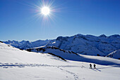 Two backcountry skiers ascending Haldenwanger Kopf, Allgaeu Alps, Vorarlberg, Austria
