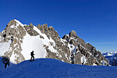 Backcountry skier against mountain scenery, Kleinwalsertal, Allgaeu Alps, Vorarlberg, Austria