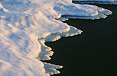 River ice patterns along shore of Vermillion river. Ontario. Canada