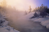 Morning light on fog. Wanapitei River rapids. Ontario. Canada