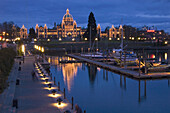 British Columbia Parliament buildings and inner harbour at dusk. Victoria, BC, Canada
