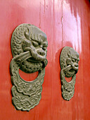 Door knockers. Beijing. China