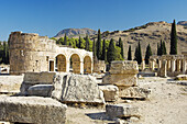 Frontinus Street and the triple gate of Domintian in the ruins of Hierapolis, Turkey.